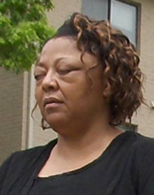 Close-up photo shows the woman's eyes are closed.